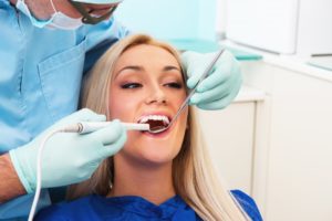 Dentist checking the lady patient