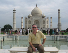 Dr. Arnold in front of the Taj Mahal.