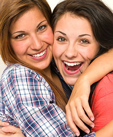 Two girls smiling